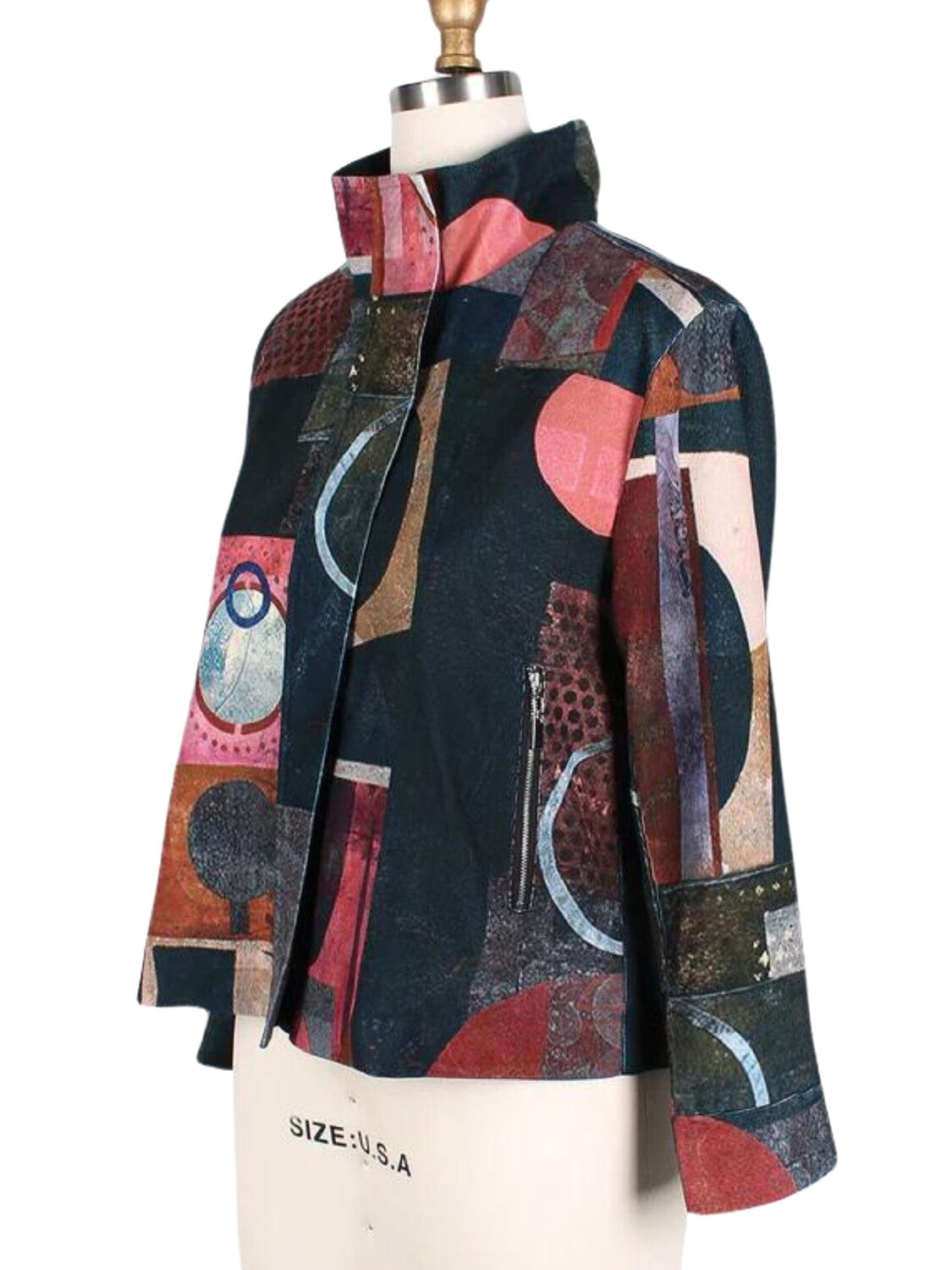 Chaqueta corta de pana con print geométrico.