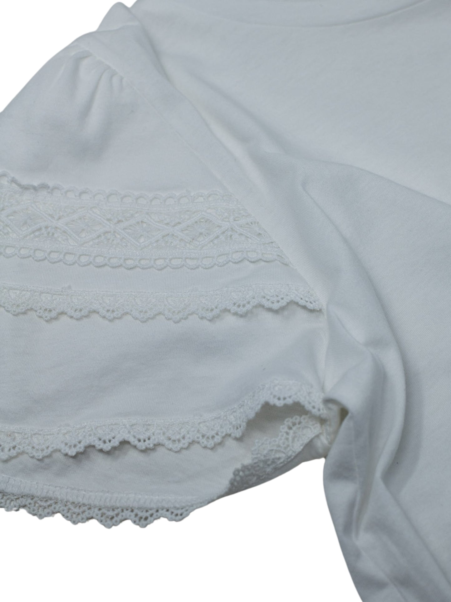 Blusa de manga corta con olanes