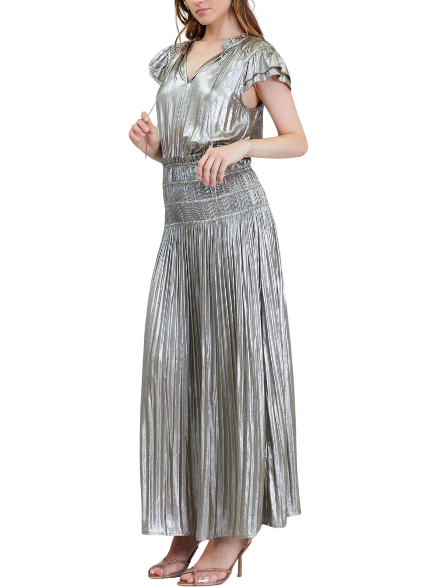 Maxi Vestido metálico de falda plisada.
