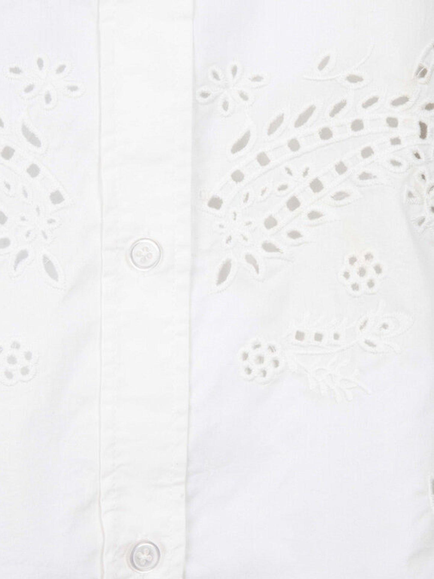 Blusa de manga larga en algodón de ojillos.