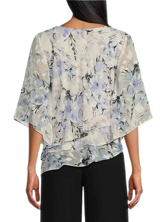 Blusa asimétrica en chifón de manga corta. - Escorpio Boutique