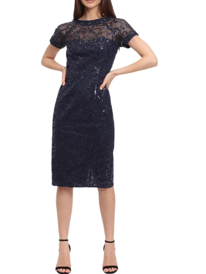 Vestido corto bordado con transparencia