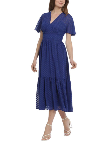 Vestido Midi de manga corta con lunares.