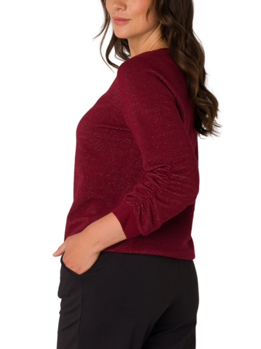 Sweater de punto con fibra metálica