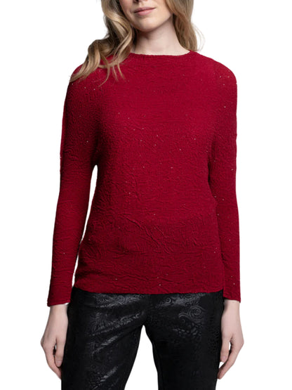 Blusa con gliter efecto arrugado.