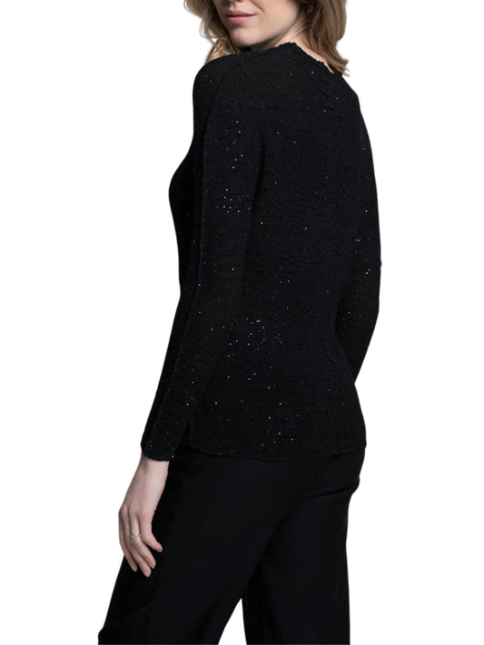 Blusa con gliter efecto arrugado.