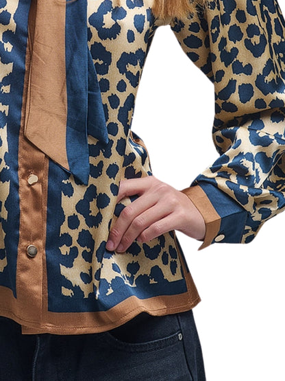 Escorpio Boutique - Blusa satinada animal print