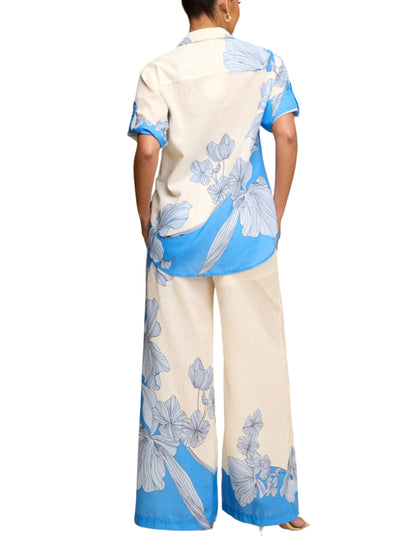 Set de blusa y pantalón con print flores gigantes.