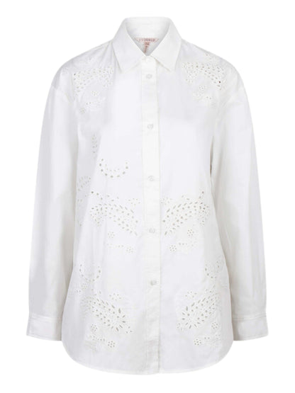 Blusa de manga larga en algodón de ojillos.