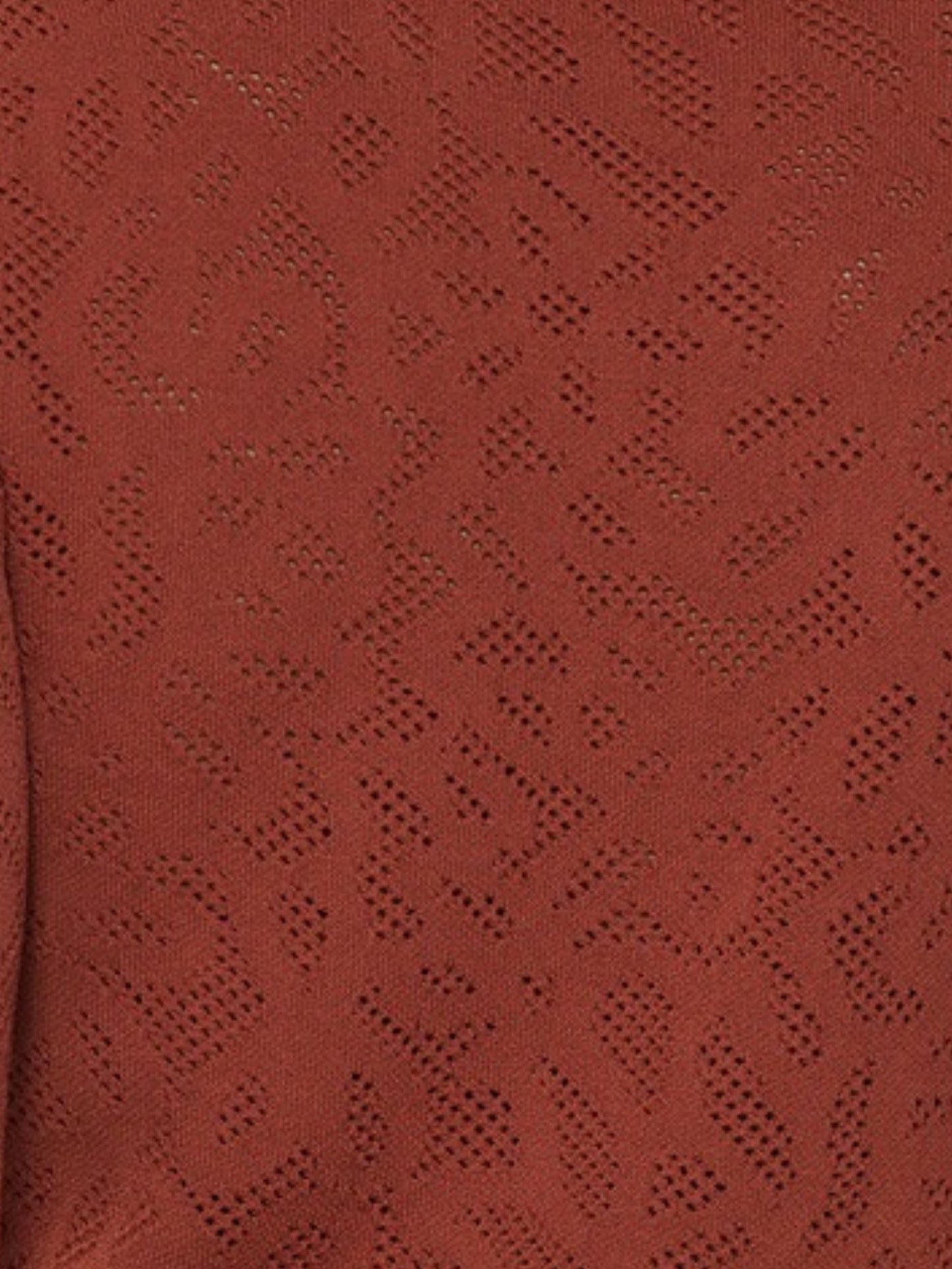 Escorpio Boutique Detalle de blusa de punto calado terracota