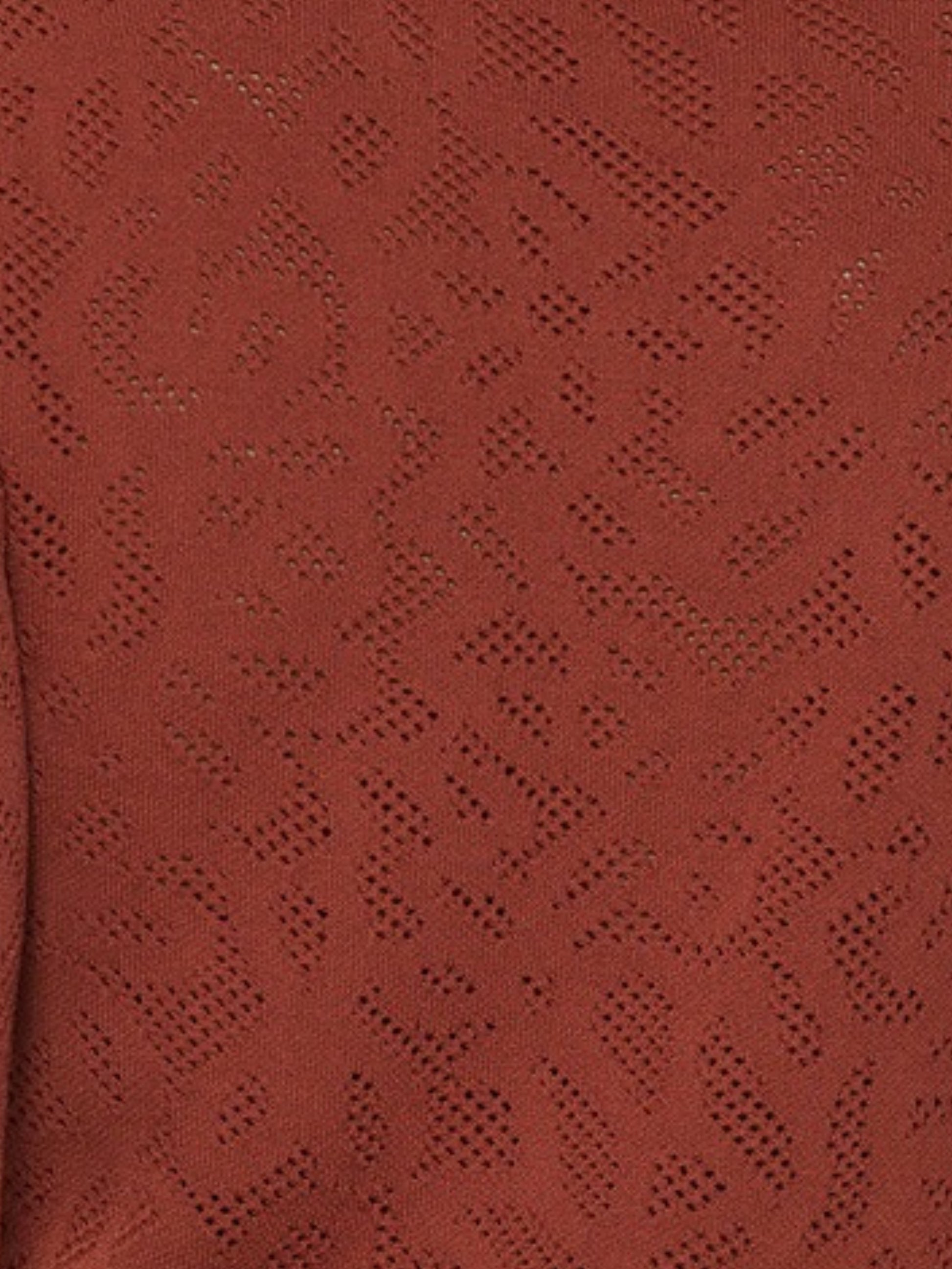 Escorpio Boutique Detalle de blusa de punto calado terracota