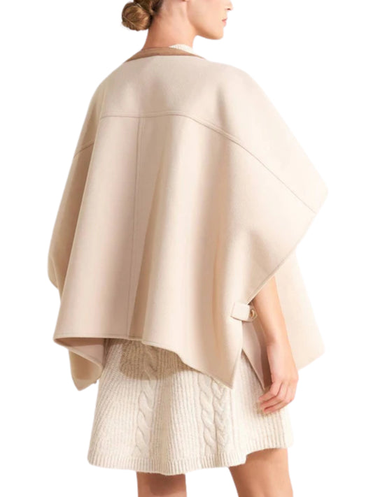 Escorpio Boutique - Poncho corto con botones dorados