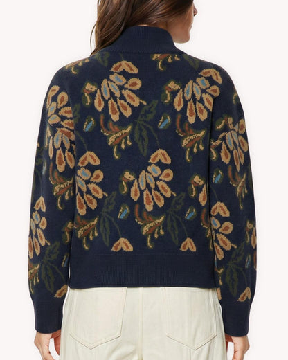 Suéter jacquard floral azul marino vista posterior con motivos florales tejidos y acabados acanalados