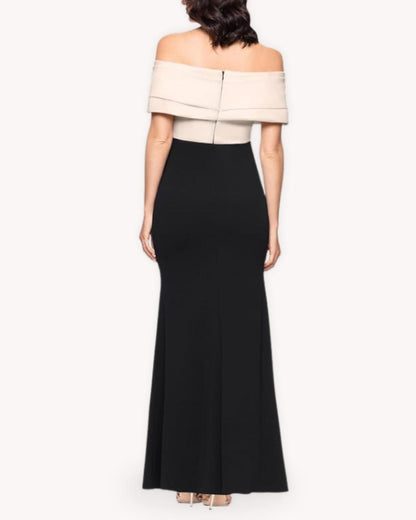 Vestido largo hombros descubiertos bicolor vista posterior con cuerpo beige y falda negra