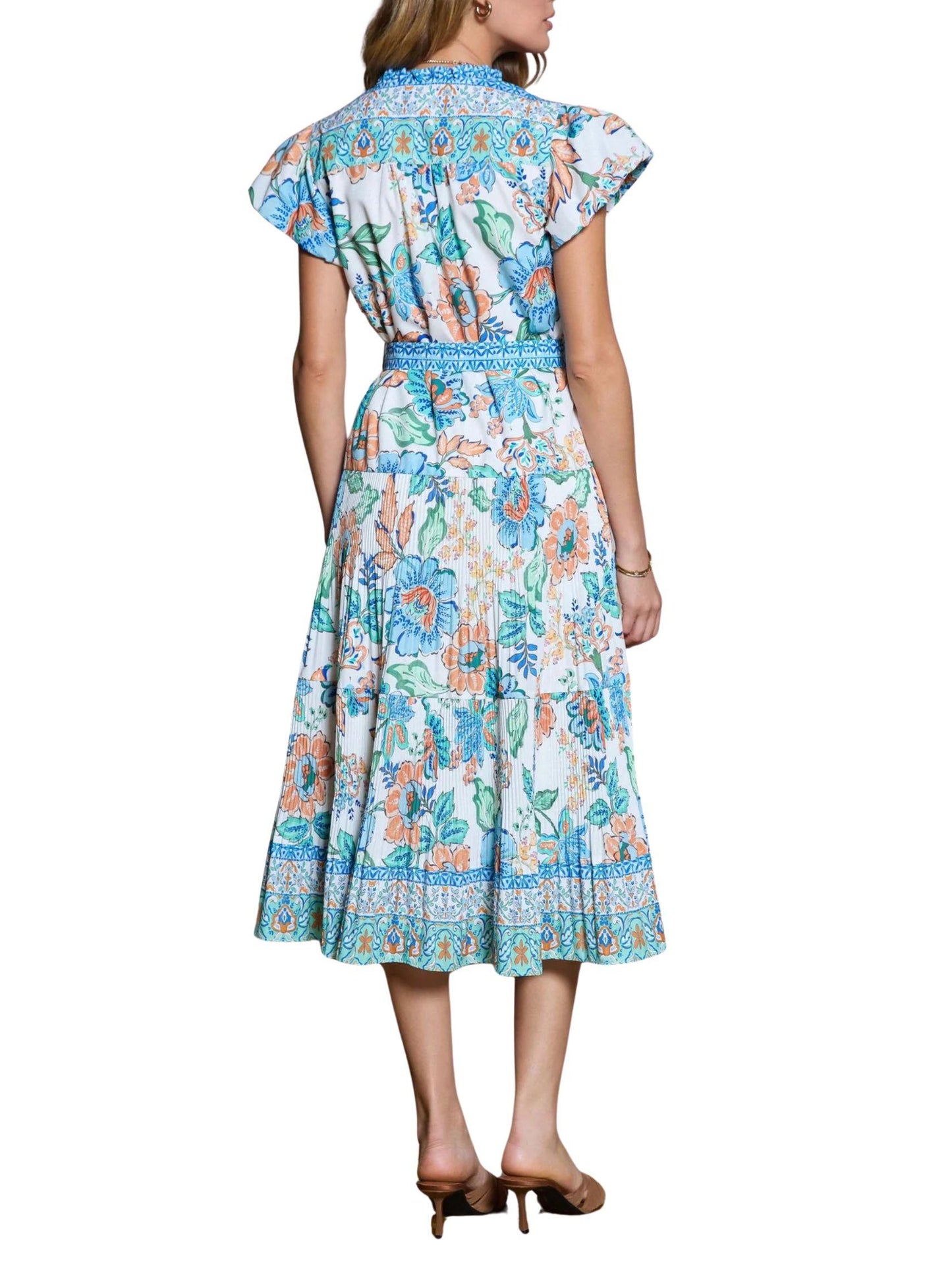 Vista trasera de vestido midi floral estampado con cinturón