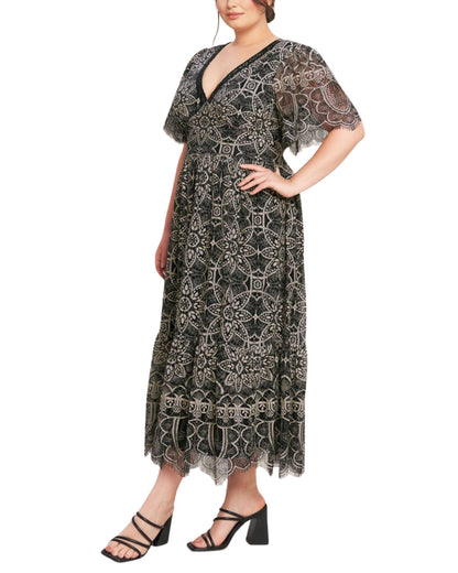vestido-midi-encaje-negro-movimiento