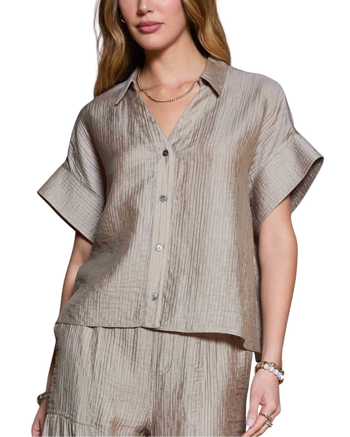 set de pantalón y blusa texturizado color beige