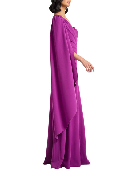Vista lateral de vestido largo fucsia de un hombro con manga tipo capa de Tadashi Shoji.