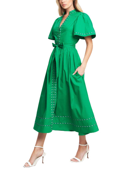 Vestido midi verde de algodón con cinturón y falda amplia, look completo.