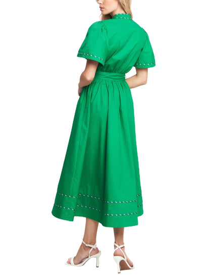 Vista posterior de vestido midi verde de algodón con manga corta tipo globo.